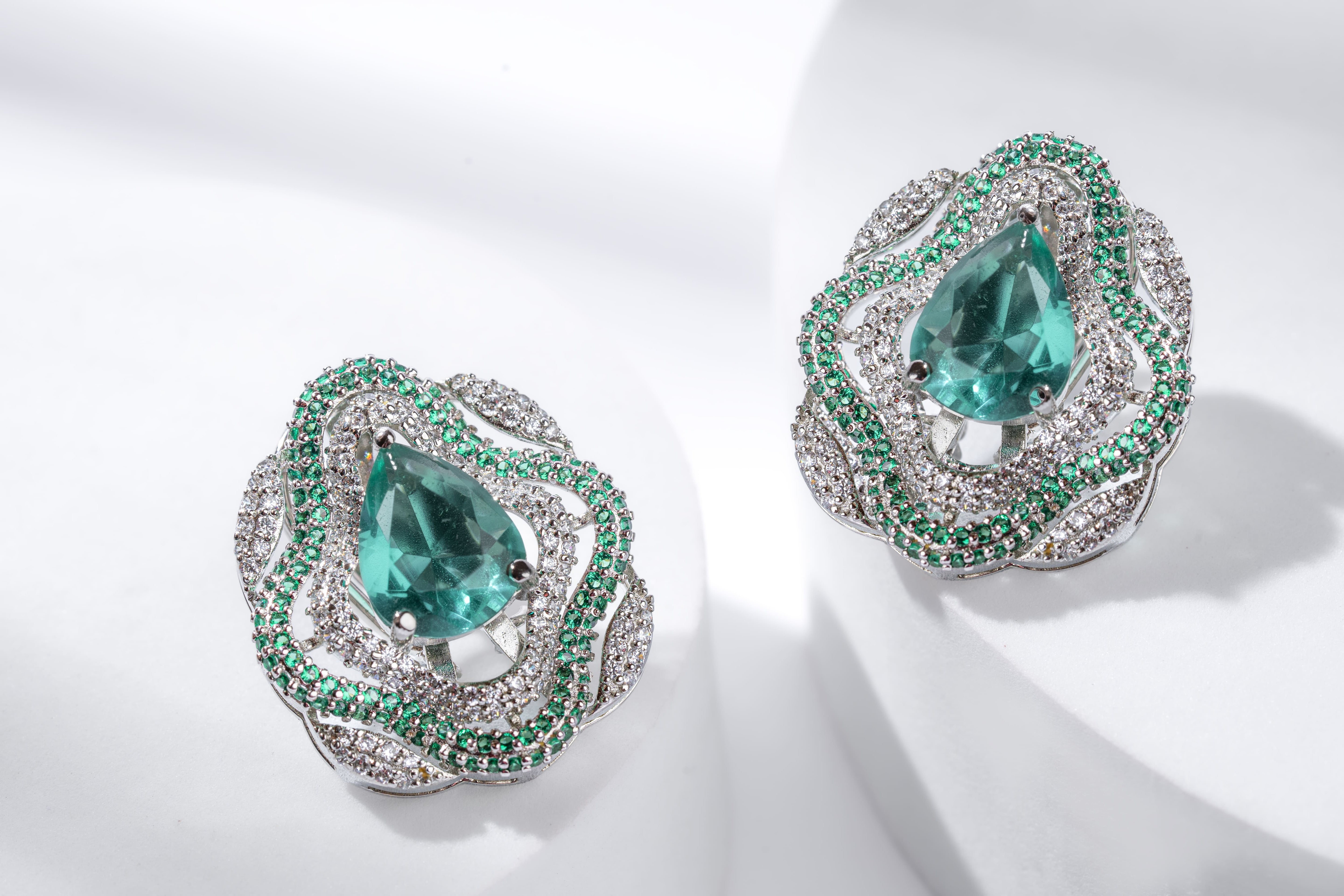green criss cross stud earring